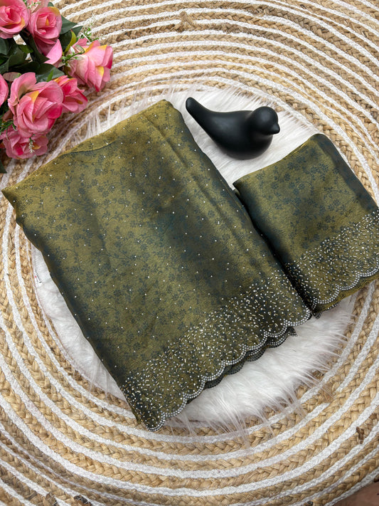 Fandy satin saree with self weaving zari pattern in body with all over siroski border and running blouse with siroski bord