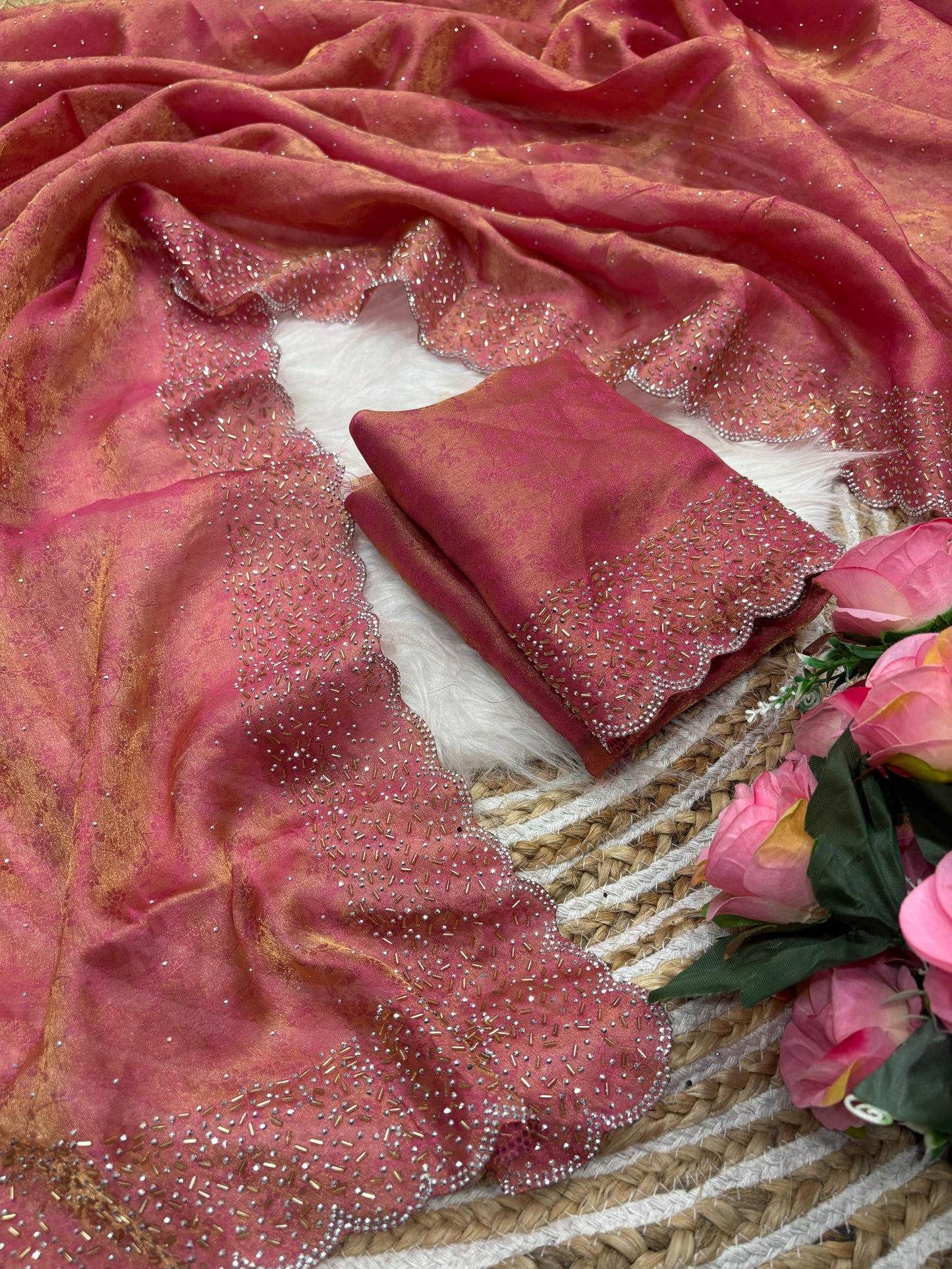 Fandy satin saree with self weaving zari pattern in body with all over siroski border and running blouse with siroski bord