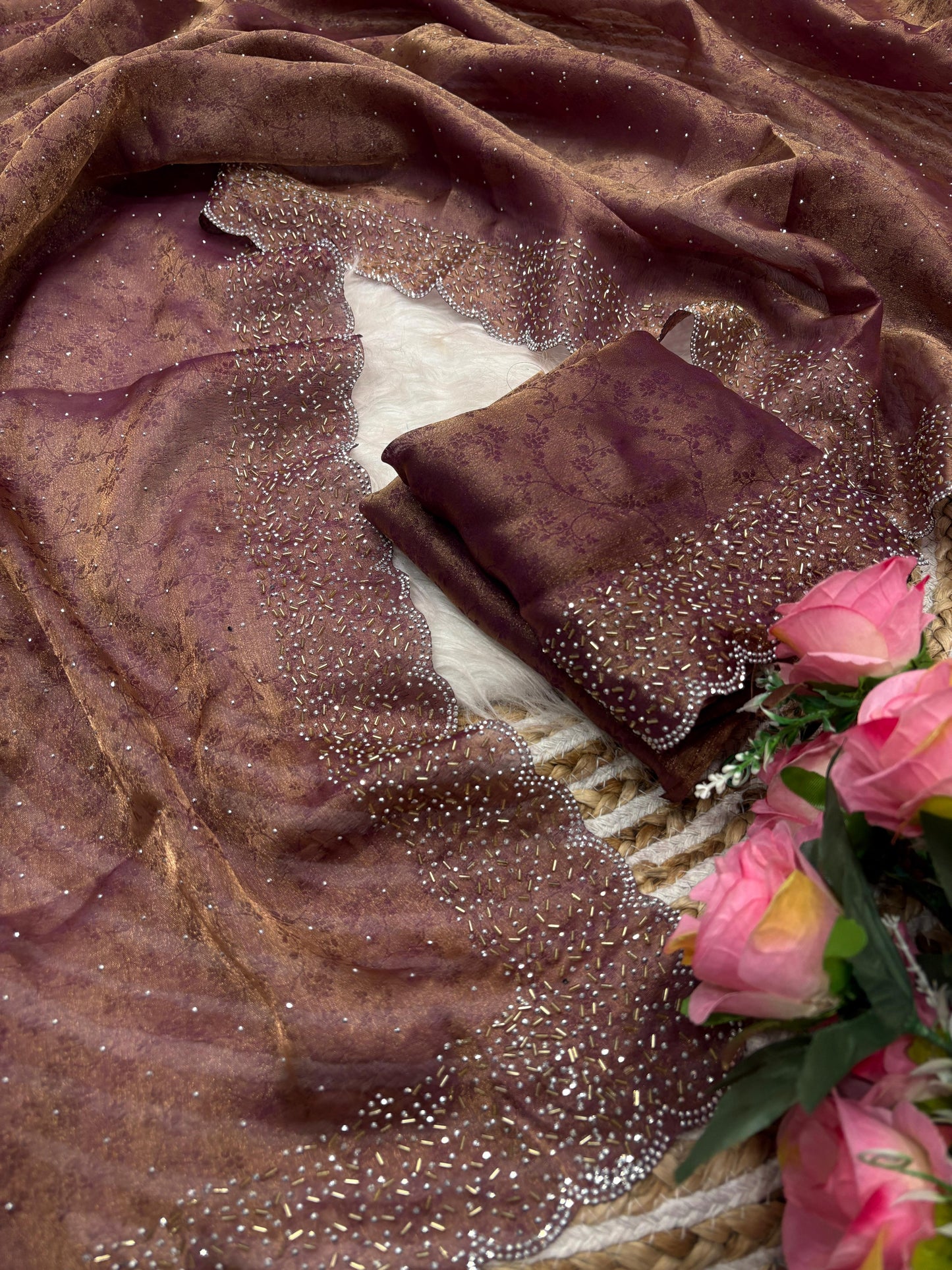 Fandy satin saree with self weaving zari pattern in body with all over siroski border and running blouse with siroski bord