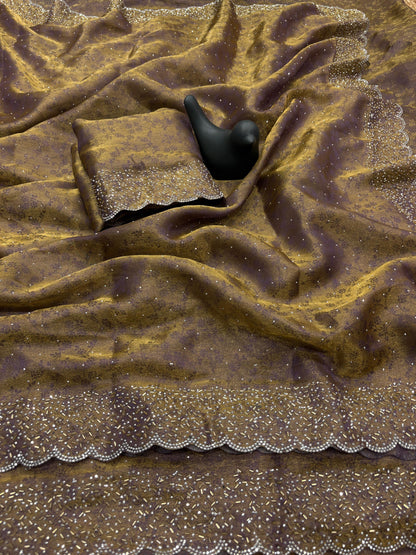 Fandy satin saree with self weaving zari pattern in body with all over siroski border and running blouse with siroski bord