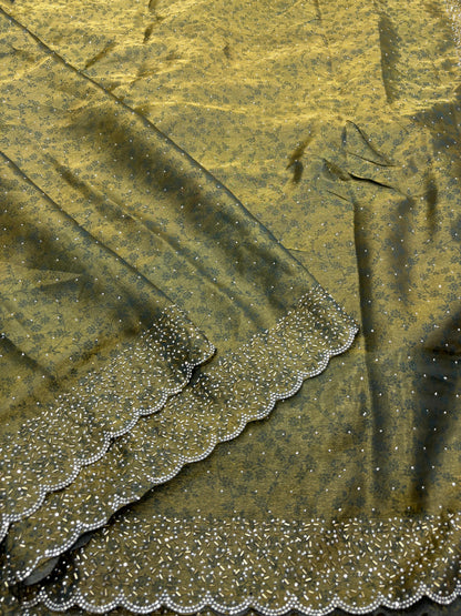 Fandy satin saree with self weaving zari pattern in body with all over siroski border and running blouse with siroski bord