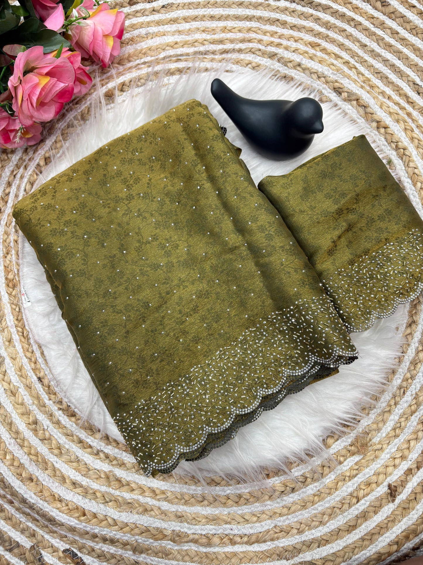 Fandy satin saree with self weaving zari pattern in body with all over siroski border and running blouse with siroski bord