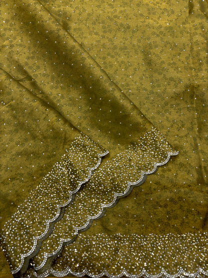 Fandy satin saree with self weaving zari pattern in body with all over siroski border and running blouse with siroski bord