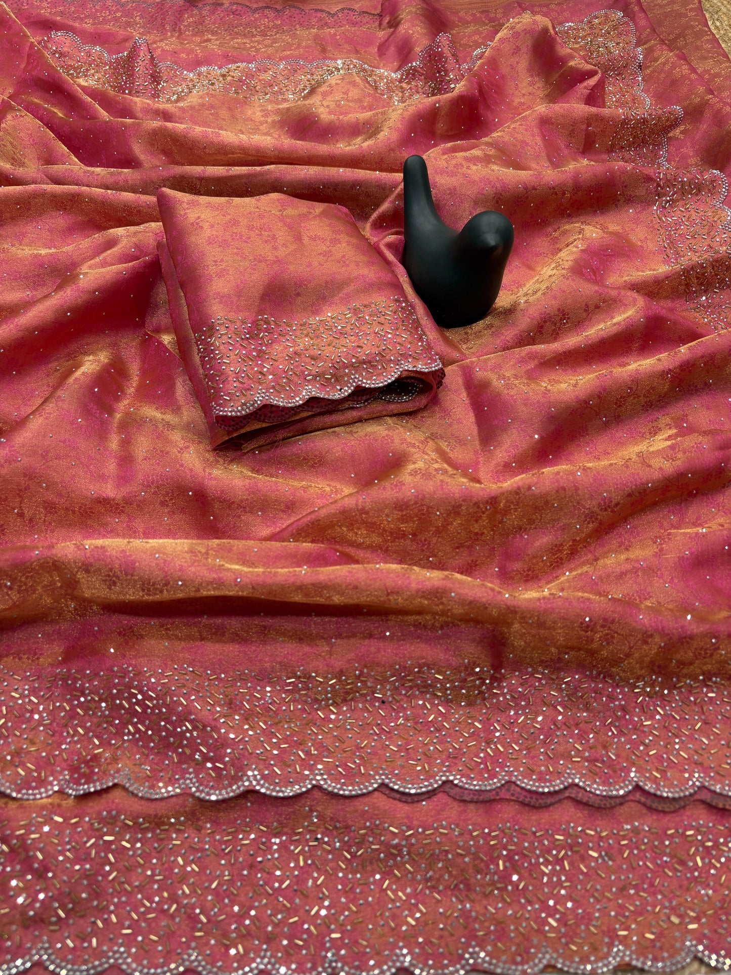 Fandy satin saree with self weaving zari pattern in body with all over siroski border and running blouse with siroski bord