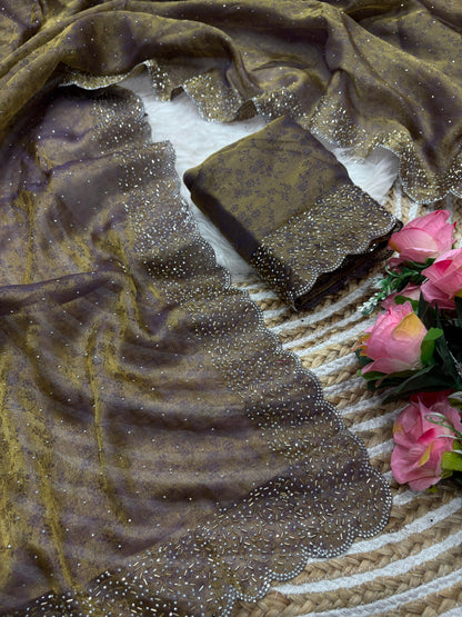 Fandy satin saree with self weaving zari pattern in body with all over siroski border and running blouse with siroski bord